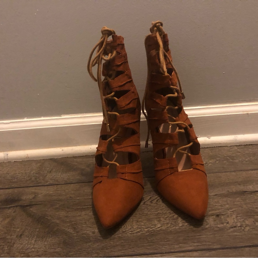 Women’s size 10 , tan lace up gladiator heels